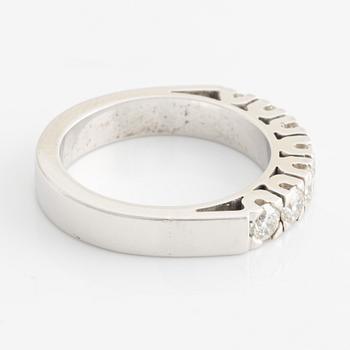 Half-eternity ring with brilliant-cut diamonds.