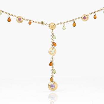 An 18K gold necklace with amethysts, peridotes and citrines.