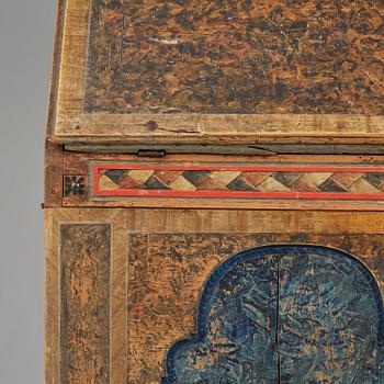 A polychrome-painted folk art cabinet from Värmland, Sweden, dated 1818.