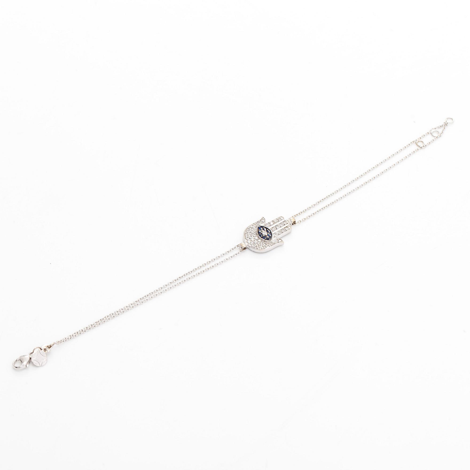 Armband, 18K guld med diamanter och safirer, "Fatimas hand".