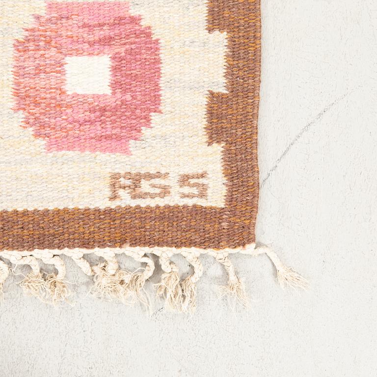 Anna-Greta Sjöqvist, a signed flat weave carpet approx 247x176 cm.