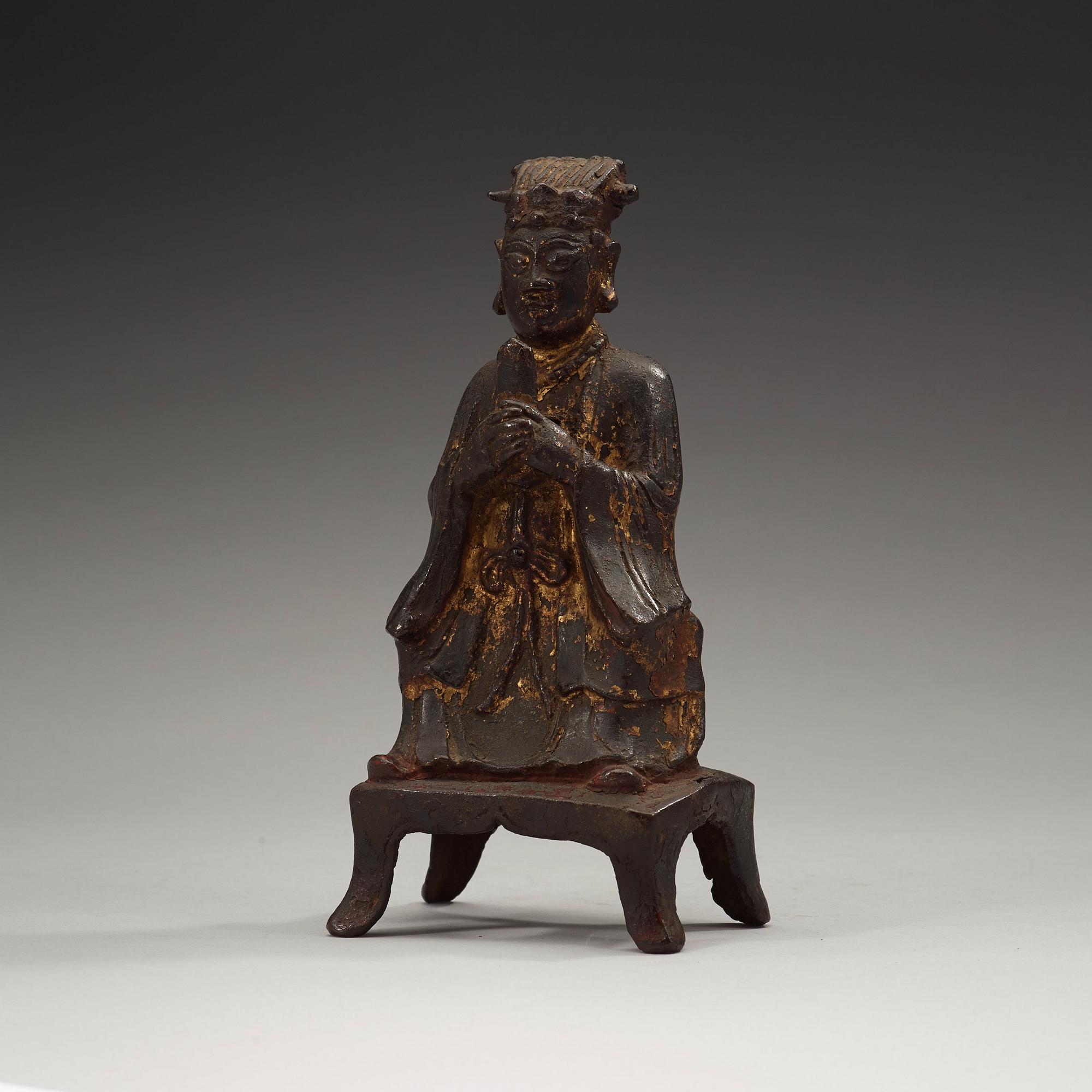 A bronze figure of a daoist deity, Ming dynasty (1368-1644).