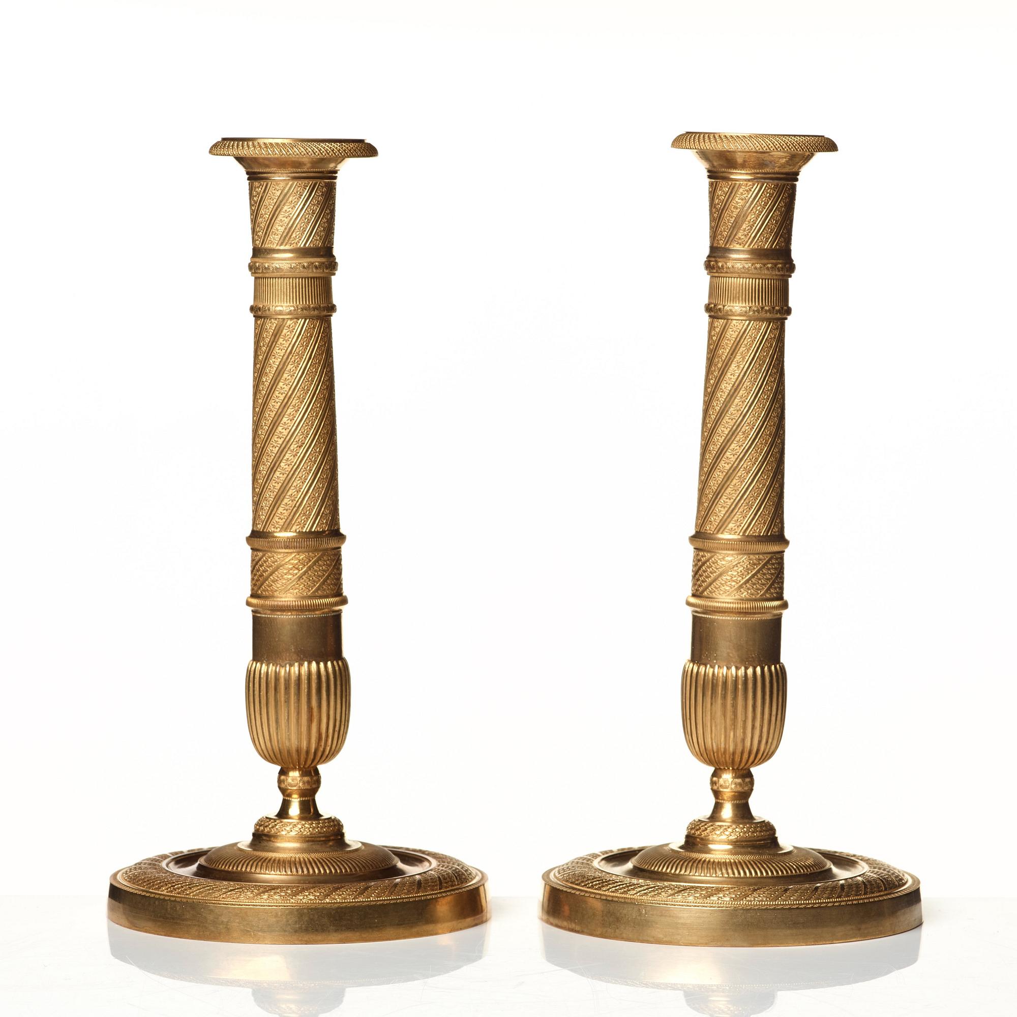 A pair of Empire candlesticks.