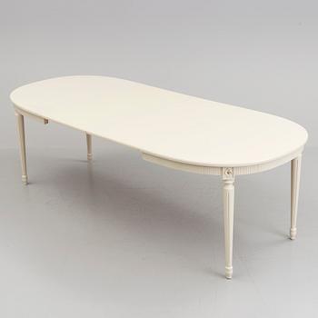 A 20th century Swedish Gustavian style dining table.