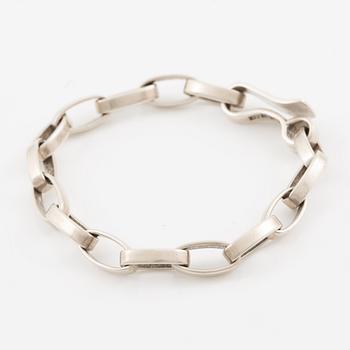 Sven-Erik Högberg samt Annette och Marie Högberg, ring, armband och collier.