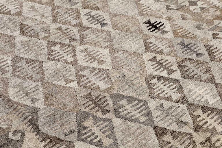 A Kilim carpet, ca 250 x 174 cm.