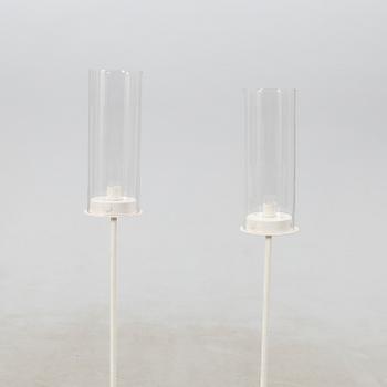 Hans-Agne Jakobsson, two floor candlesticks, metal/forge, late 20th century.