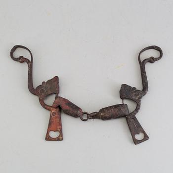 A wrought iron horse bridle 17th century.