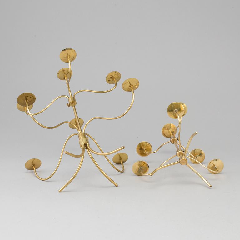 Two brass candelabra, designed by Josef Frank. Firma Svenskt Tenn.