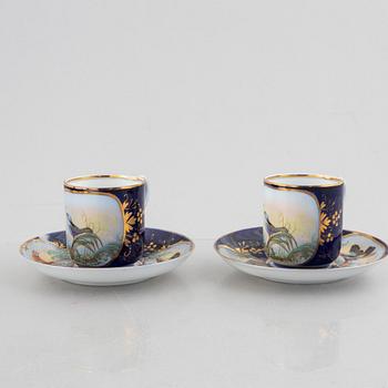 A set of nine porcelain coffee cups with saucers, Kuznetsov, Russia (1891-1917).