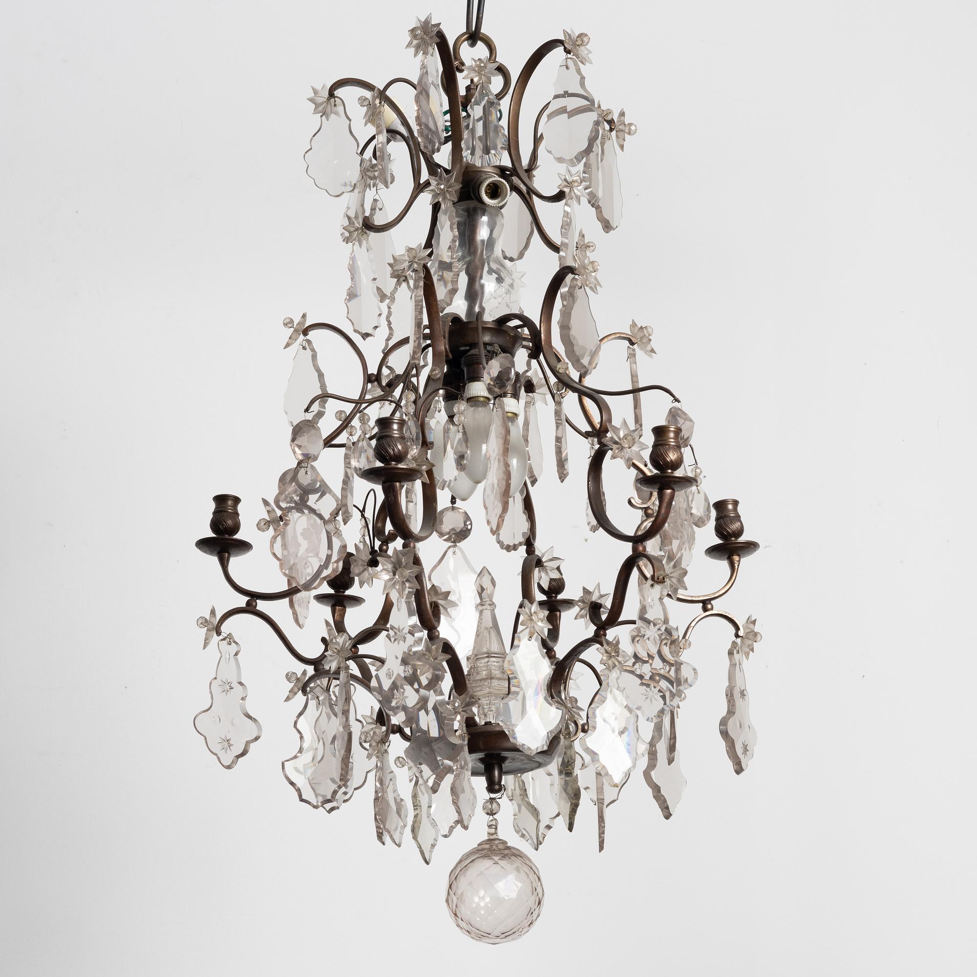 A Rococo style chandelier, early 20th century.
