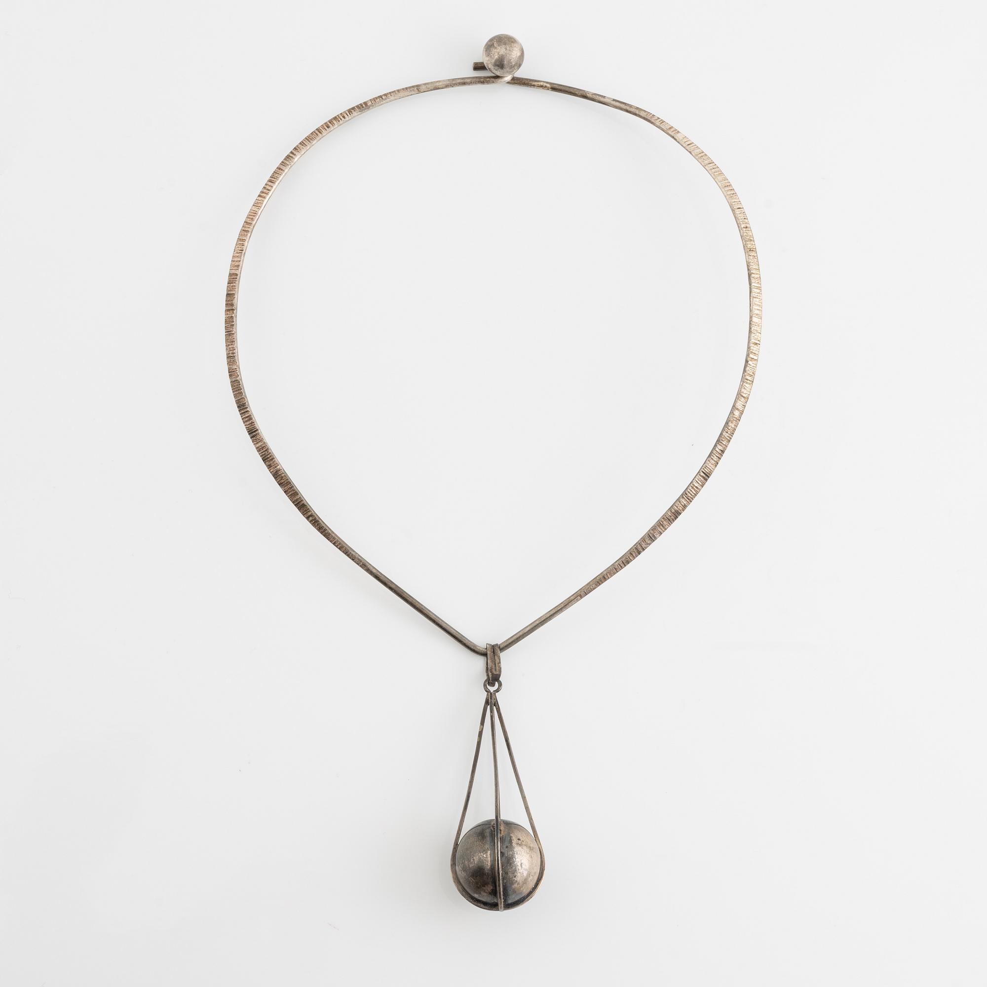 Silver necklace with pendant.