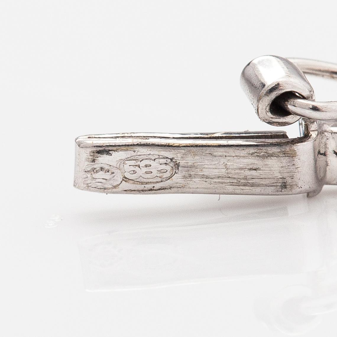 Armband, 14K vitguld, safirer, diamanter ca. 0.20 ct tot enl gravyr.