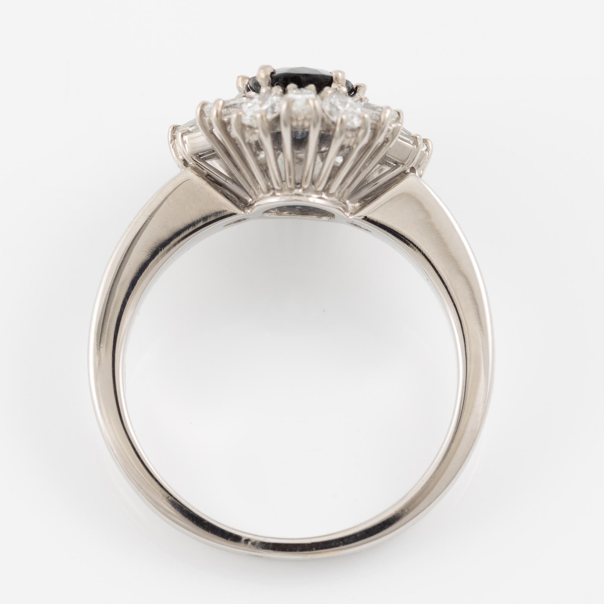 Ring, 18K white gold with sapphire and trapeze- and navette-cut diamonds.