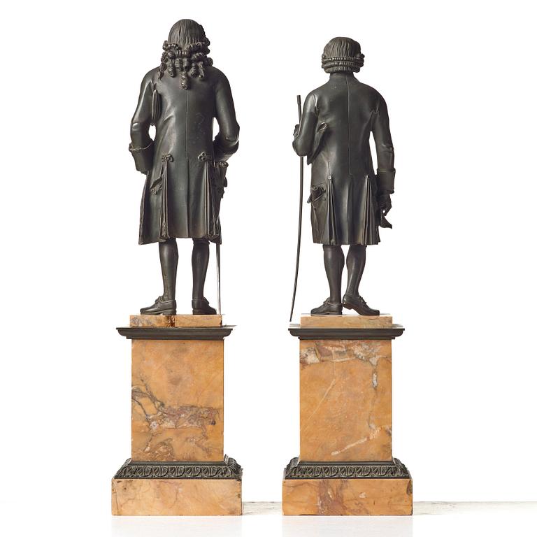 A pair of French bronze figures, circa 1825.