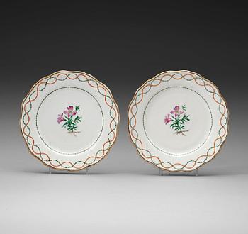 A pair of famille rose armorial dishes for Claes Alströmer, Qing dynasty, Qianlong (1736-95), ca 1770.