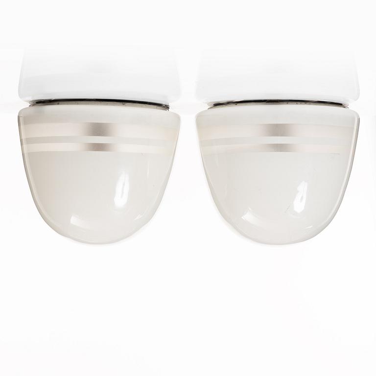 Harald Notini, a pair of ceiling lamps, variant of model "10148", Arvid Böhlmarks Lampfabrik, Stockholm, 1930s.