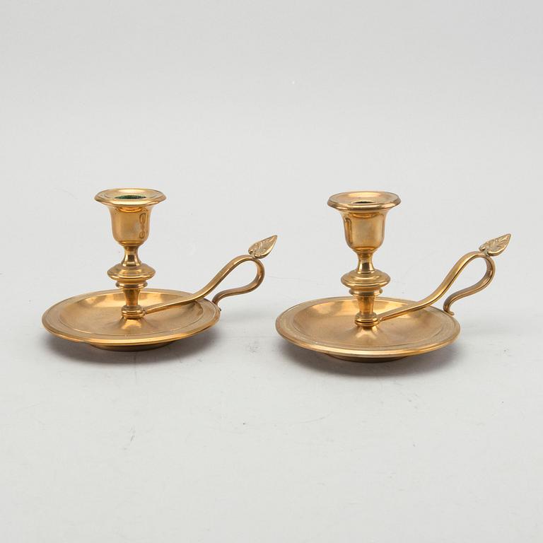 A pair of Gusum brass candelsticks.