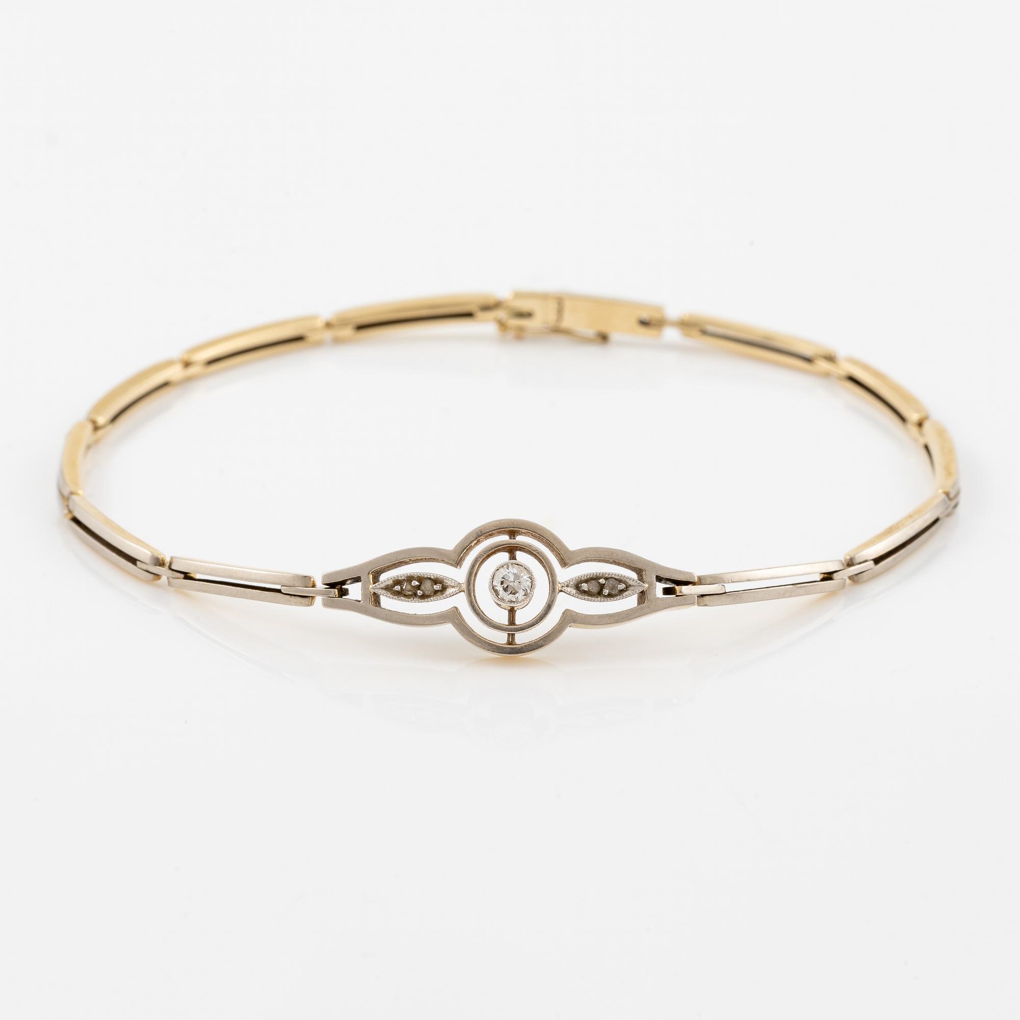 Bracelet in 14K gold set with old-cut and rose-cut diamonds.