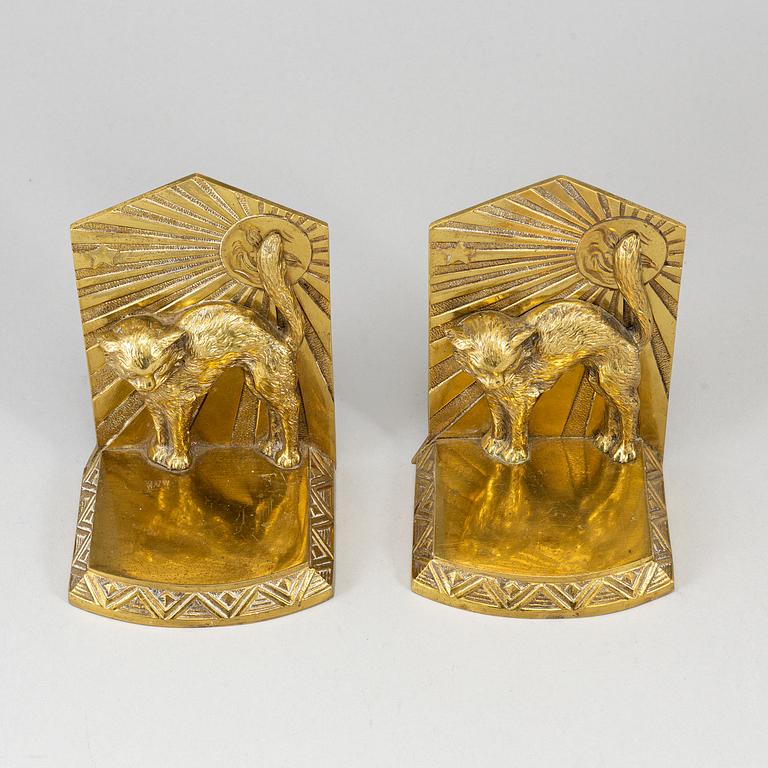A pair of art déco bronze book ends, 1930s.