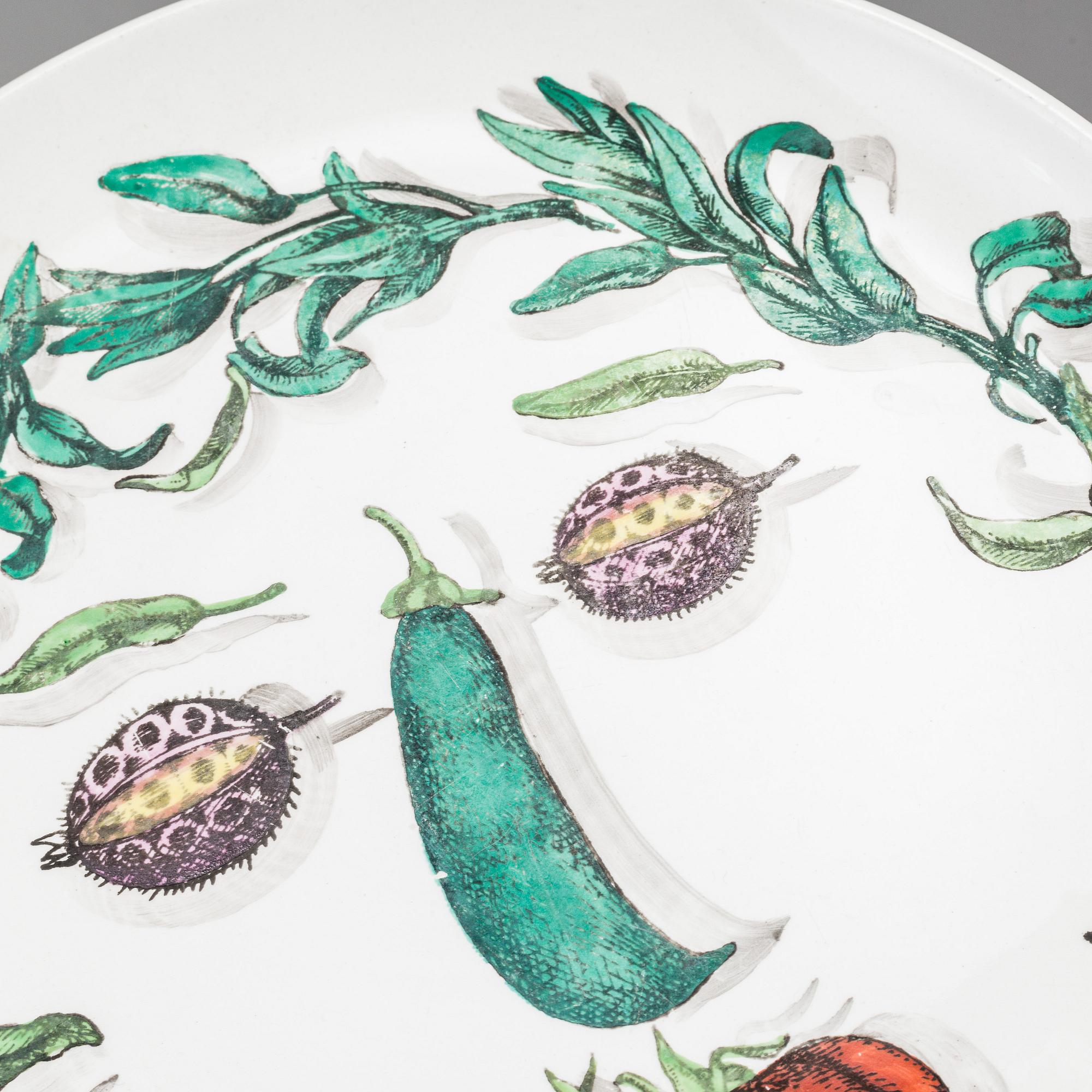 PIERO FORNASETTI, 2 "Arcimboldesca" plates + 1 "Piscibus" plate,