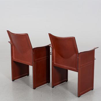 A PAIR OF "KORIUM" CHAIRS BY TITO AGNOLI, MATTEO GRASSI.