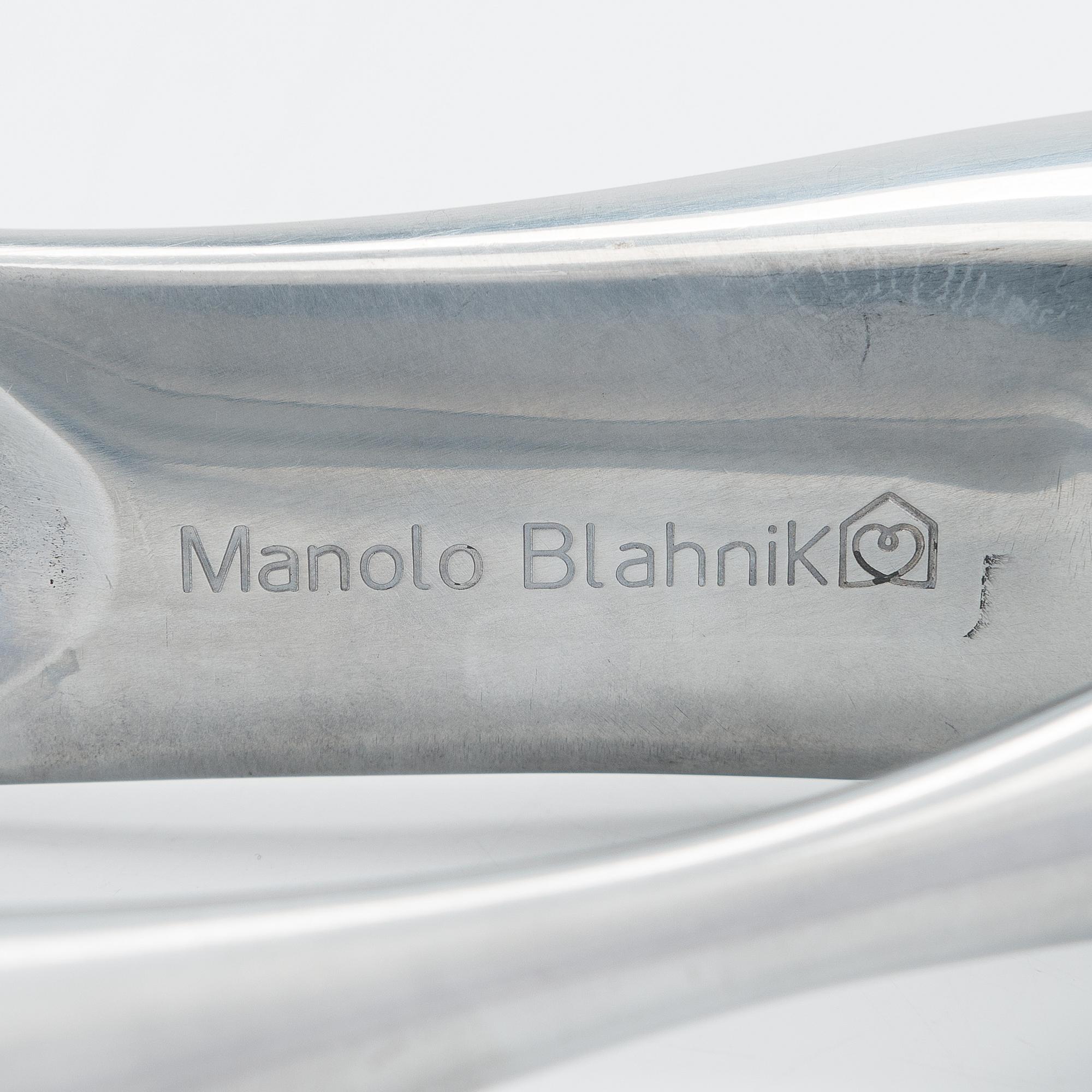A metal shoe horn by Manolo Blahnik, 2000s.