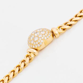 An 18K gold necklace set with round brilliant-cut diamonds.