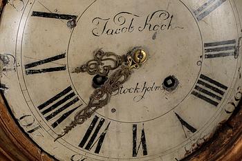 A Gustavian wall hanged clock, dial marked "Jacob Kock Stockholm", maded in the second half of the 18th century.