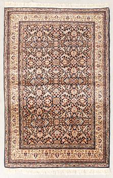 An old oriental carpet approx 214x143 cm.