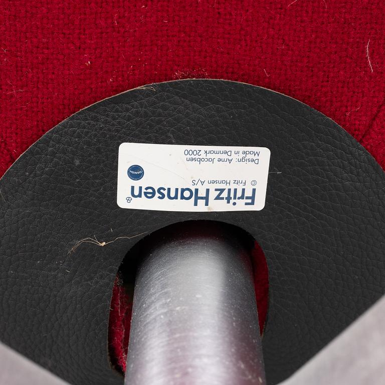 Arne Jacobsen, an armchair with footstool, "The Egg", Fritz Hansen, Danmark, 2000.