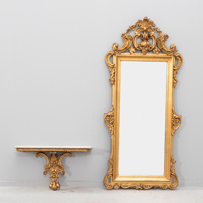 A gilded Neo Rococo mirror with console later part of the 20th century.