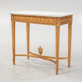 A Gustavian giltwood console table, around year 1800.