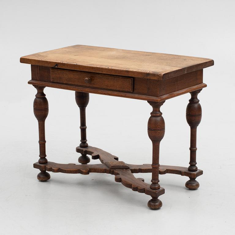 A table, late 19th century. Baroque style.
