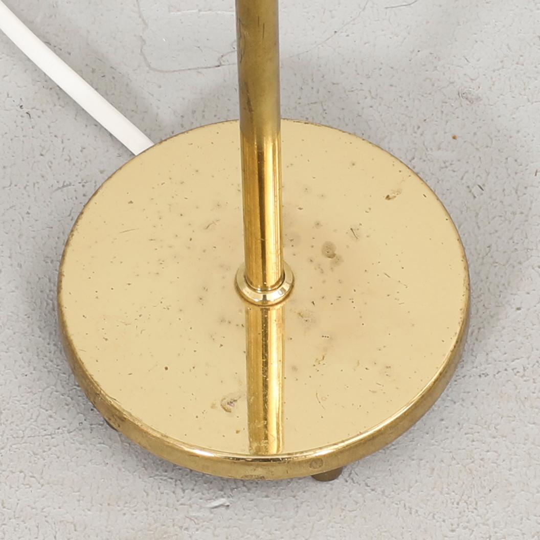 A pair of Falkenbergs belysning brass table lamp later part of the 210th century.