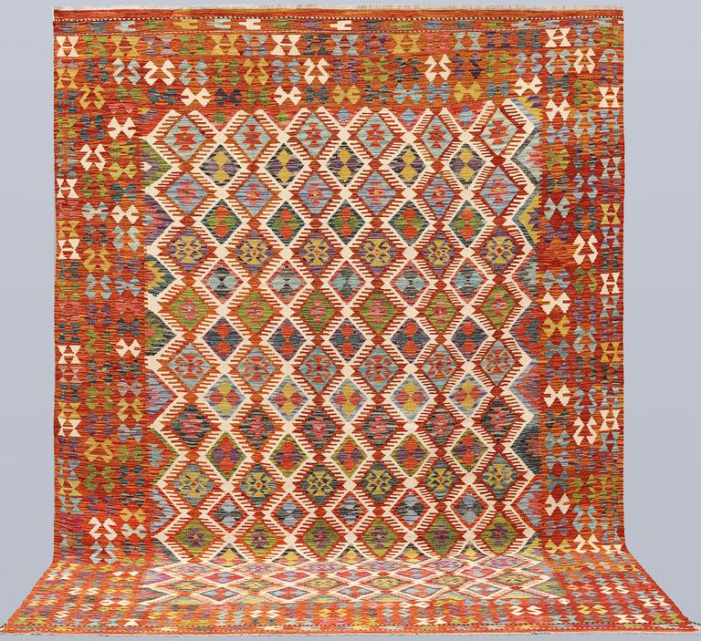 A Kilim carpet, approx. 347 x 250 cm.