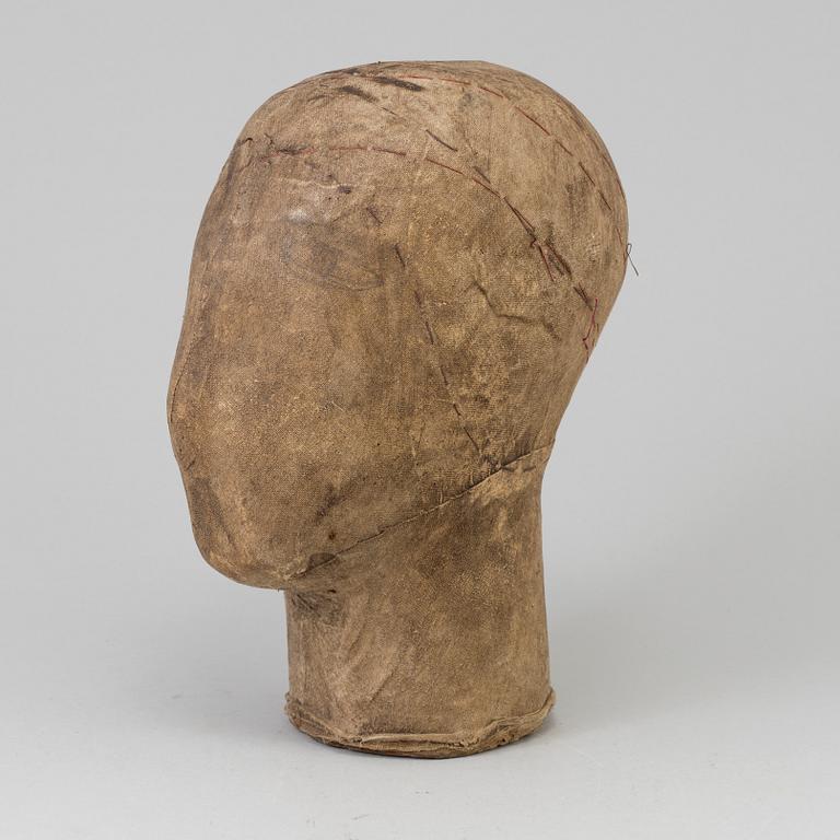 A 19TH CENTURY WIG STAND, covered in linen.