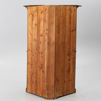 A corner cupboard, dated 1779.