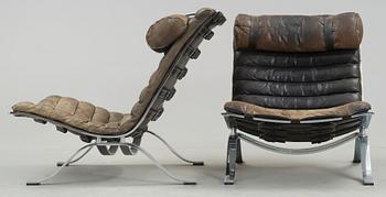 A pair of Arne Norell "Ari" black leather and steel easy chairs by Norell Möbel AB, probably 1960-70's.