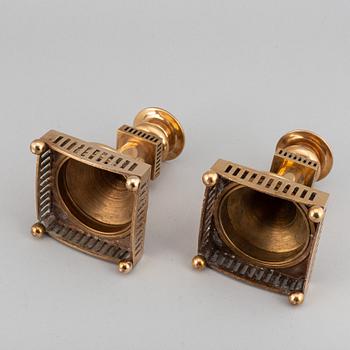 A pair of Gusum brass chandelabras, Sweden, 20th Century.