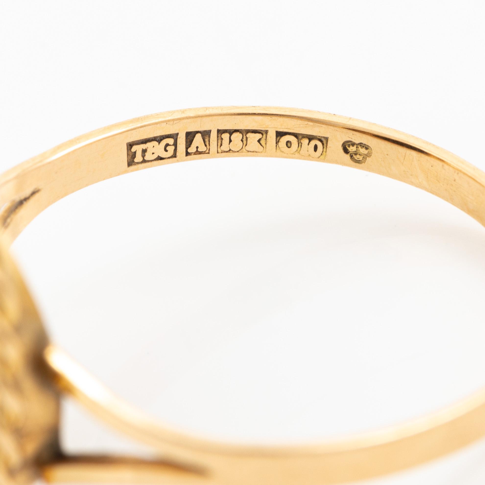 Ring 18K guld med svart sten.