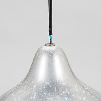 Lisa Johansson-Pape, a set of three pendant lights for Stockmann Orno, Finland.