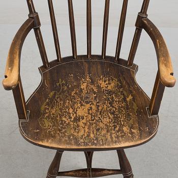 a writing desk chair from the late 19th century.