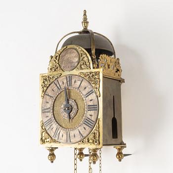 A George II brass lantern clock by John Wainwright (watchmaker in Wellingborough 1738-51).