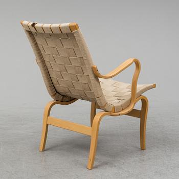 An 'Eva' easy chair by Bruno Mathsson for Dux.
