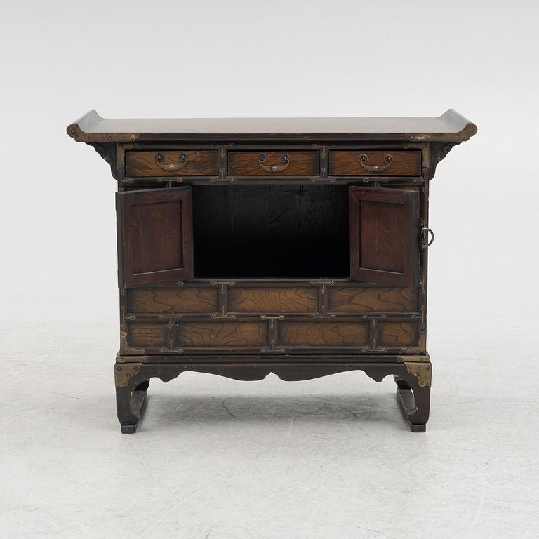A Chinese hardwood cabinet, early 20th century.