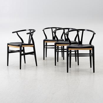 Hans J. Wegner, four CH24/ "Wishbone" chairs, Carl Hansen & Son, Denmark, 21st century.