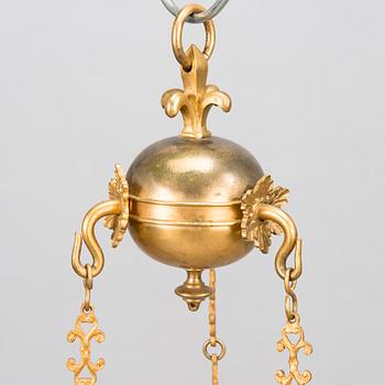 A brass hanging basket, 19th century.