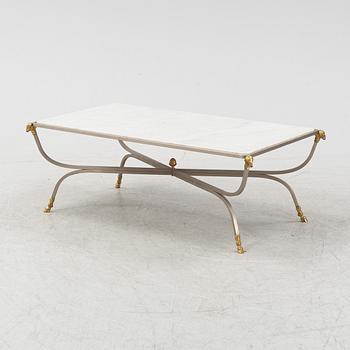 A marble top coffee table, probably Italy, second half of the 20th Century.