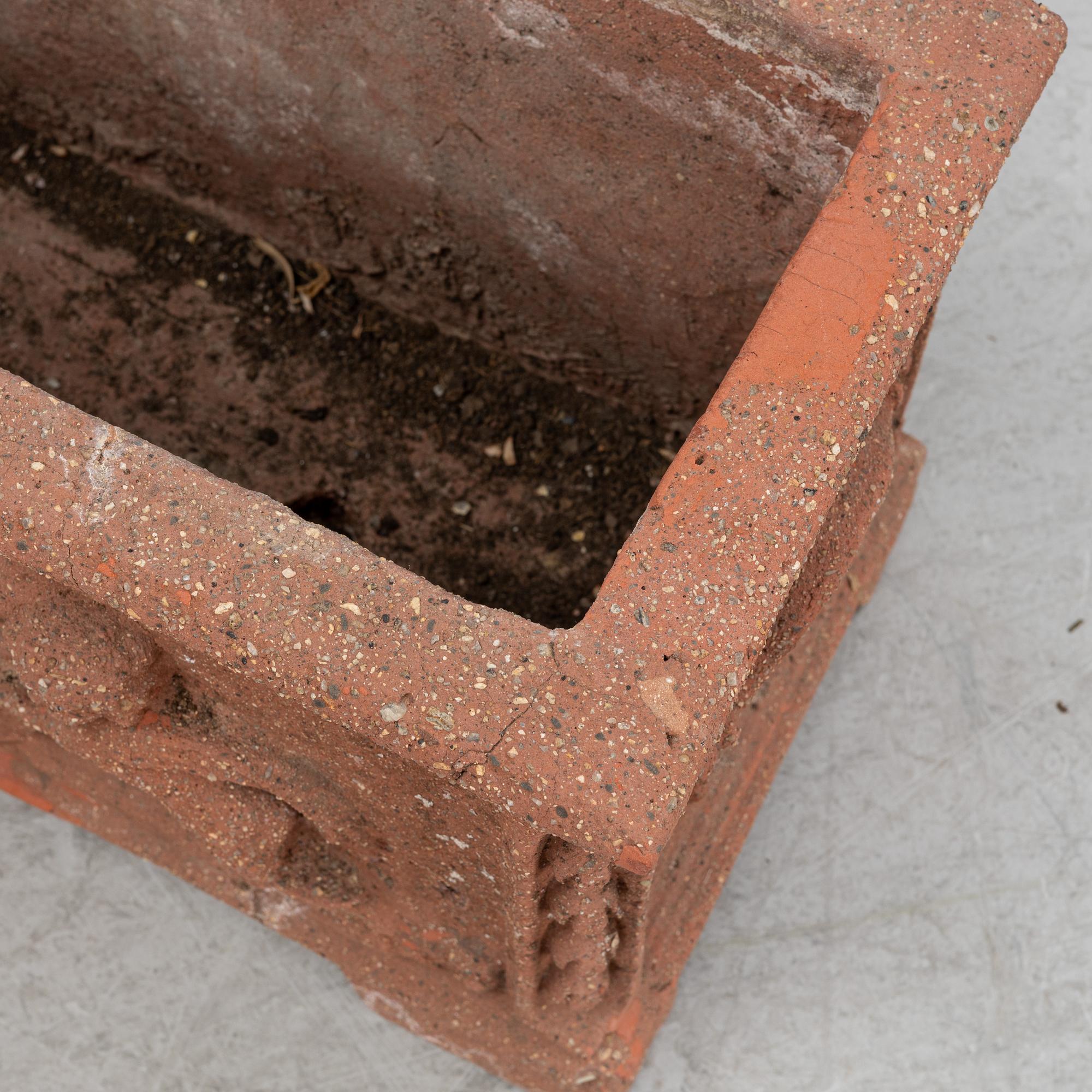 A pair of terracotta garden pots, 20th/21st Century.